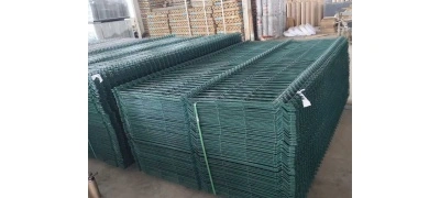 ANJIA Group – mass stock of green PVC coated 3D curved welded fence panels in warehouse
